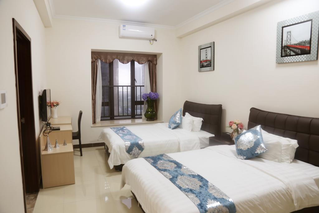 Guangzhou Yi Long International Apartment Номер фото